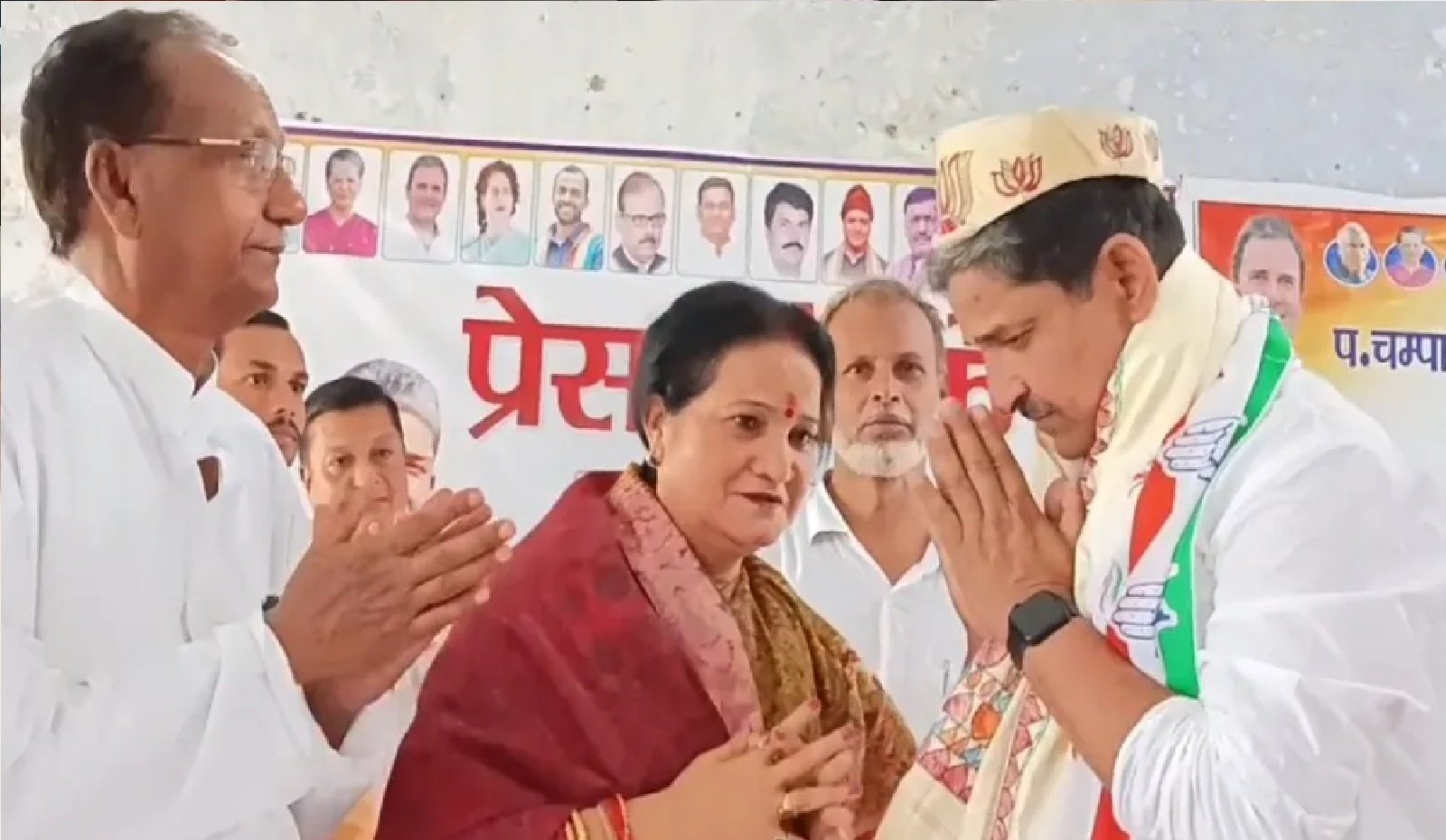 Wकांग्रेस सांसद के सिर पर कमल की टोपी, मचा बवाल